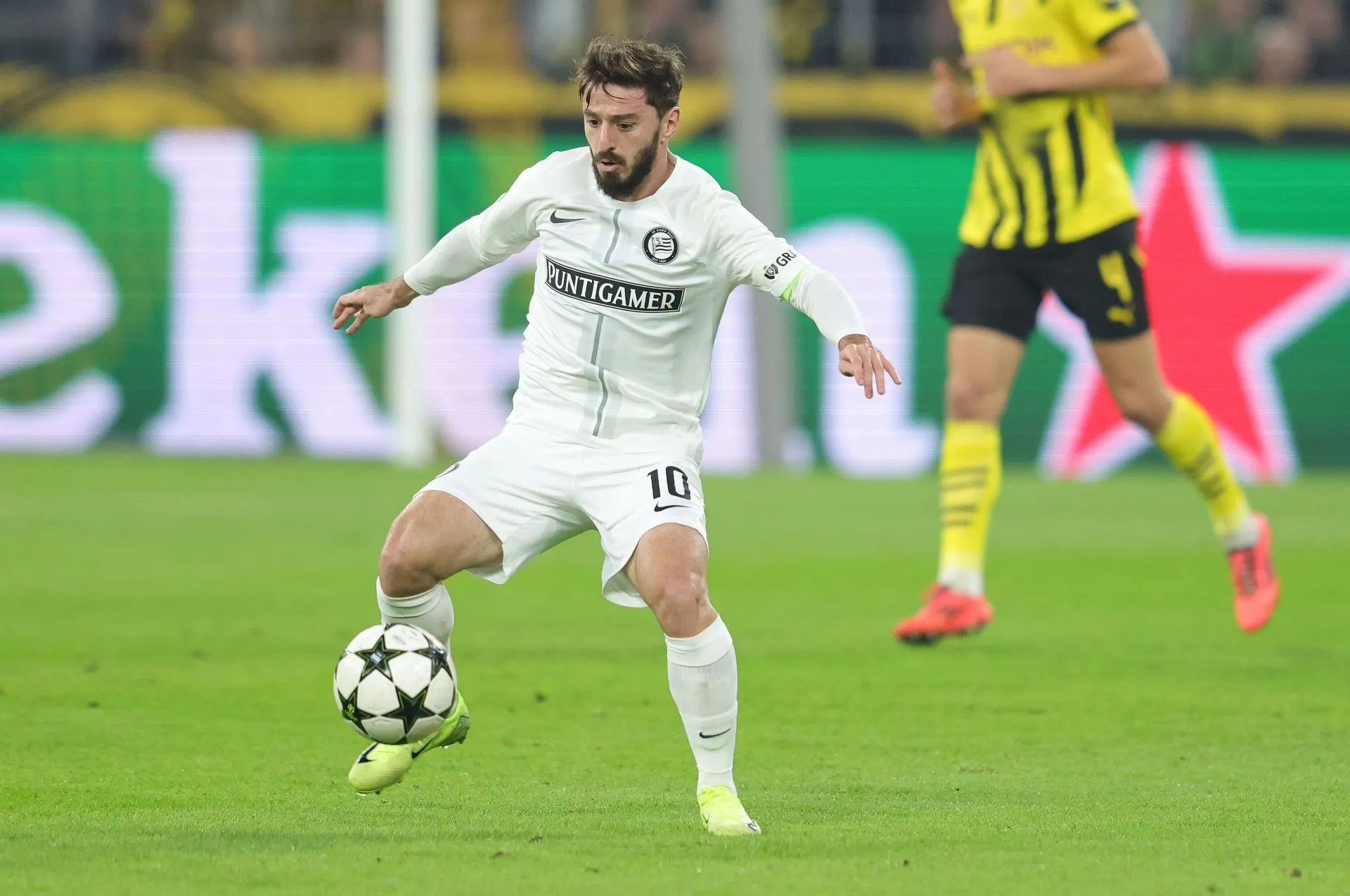 Dortmund's Late Heroics: Malen Seals Victory Against Sturm Graz