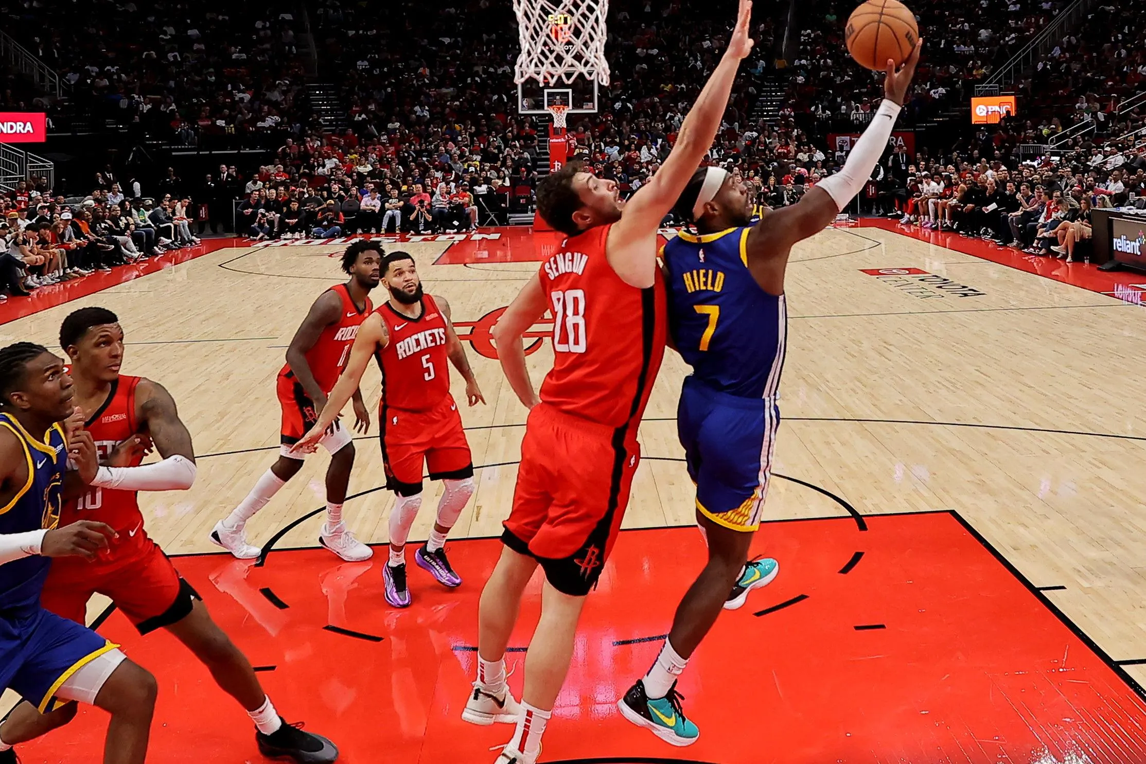 Warriors Edge Rockets in Thrilling Overtime Clash: A 127-121 Victory!