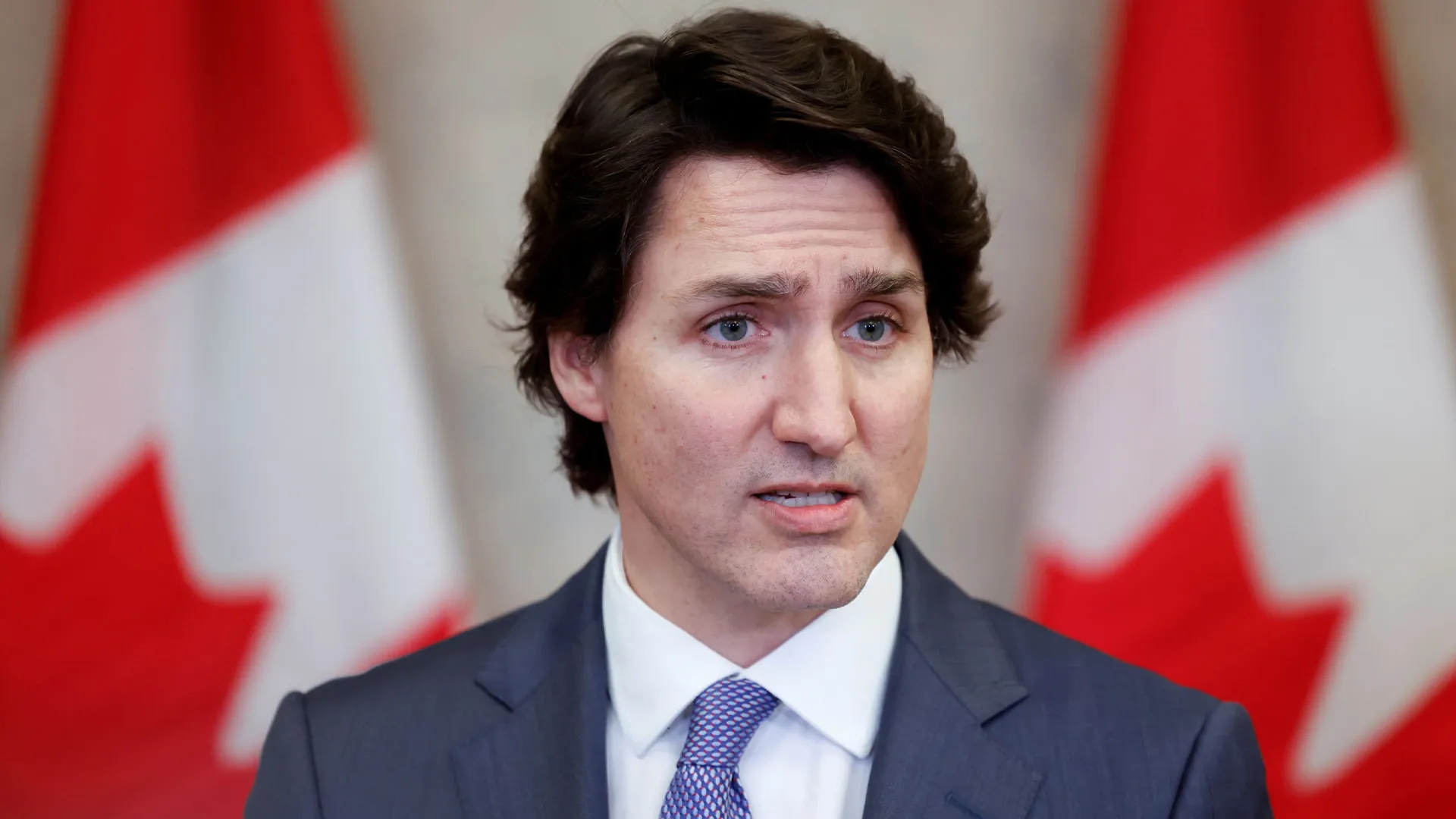 Trump's "Governor" Quip: Trudeau Responds to Tariff Threats Amid Rising Tensions