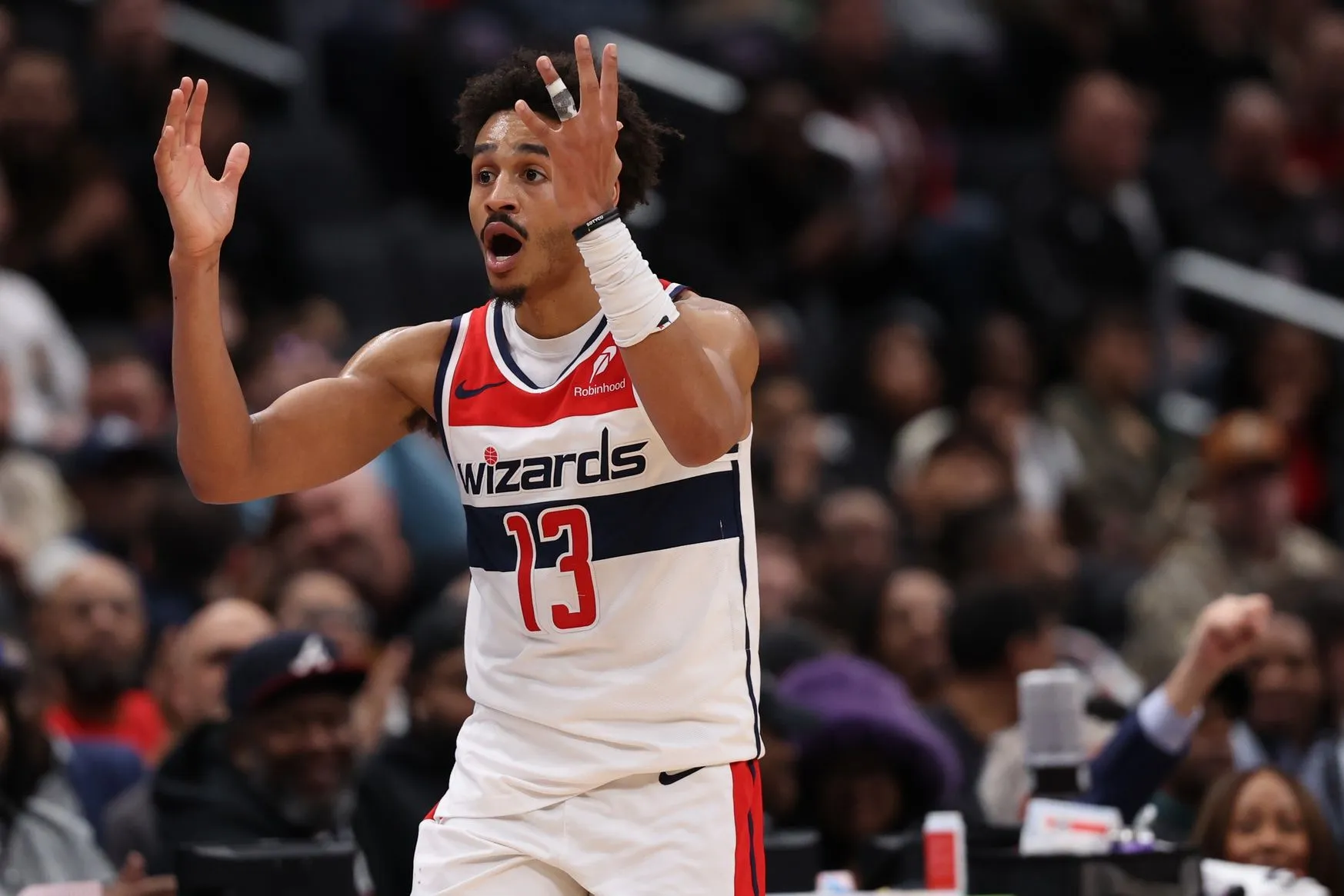 Epic Showdown: Wizards Edge Raptors in Heart-Stopping Thriller!